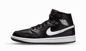 Air Jordan 1 Mid Black White Air Jordan 1 Mid sneakers with bold retro vibes