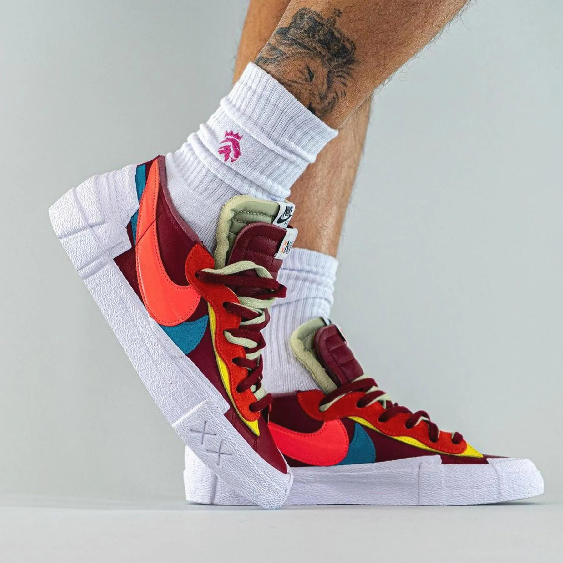 KAWS x sacai x Nike Blazer Low Team Red Sacai collaboration