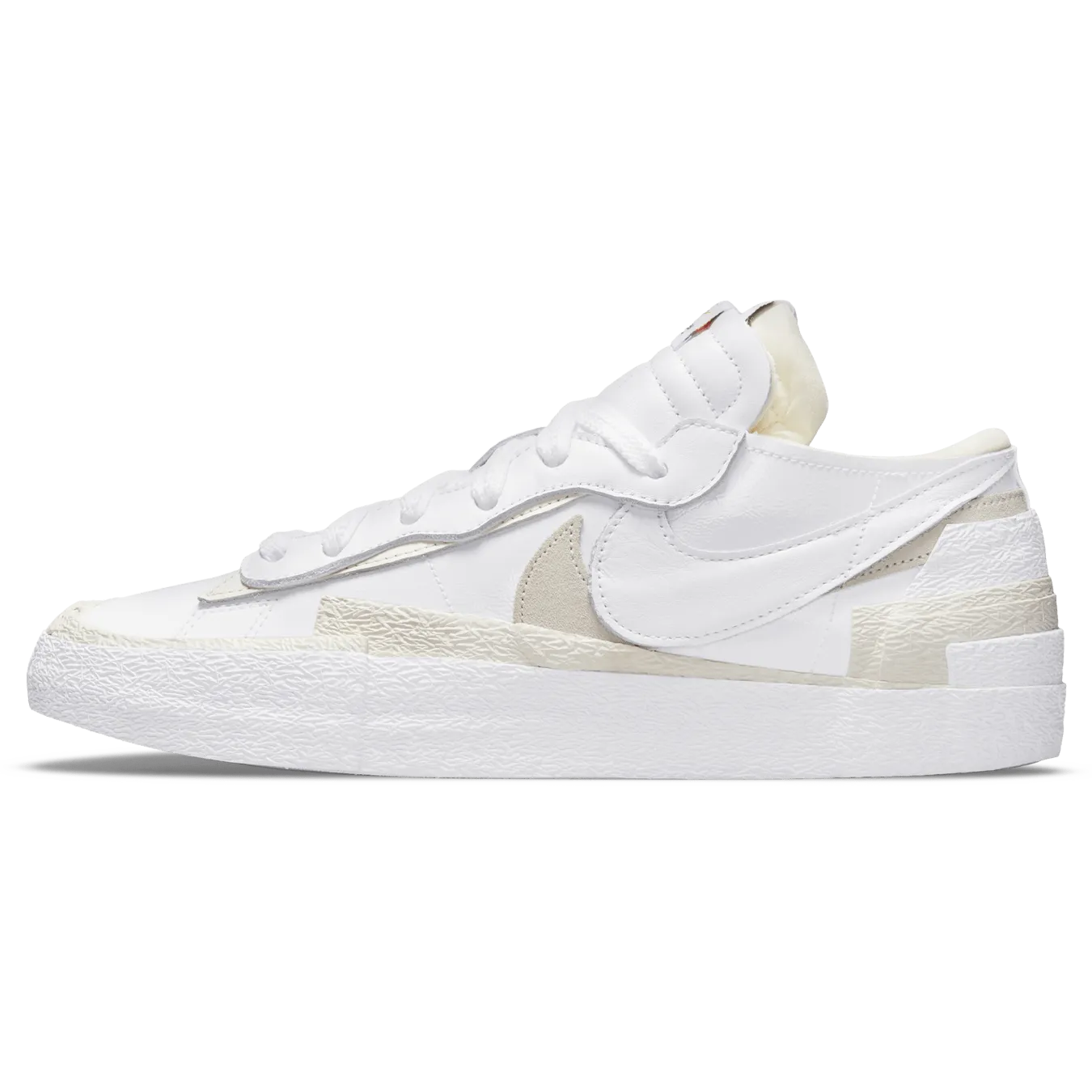 Kaws x sacai x Nike Blazer Low 'White Patent' nike sacai collaboration stylish sneakers