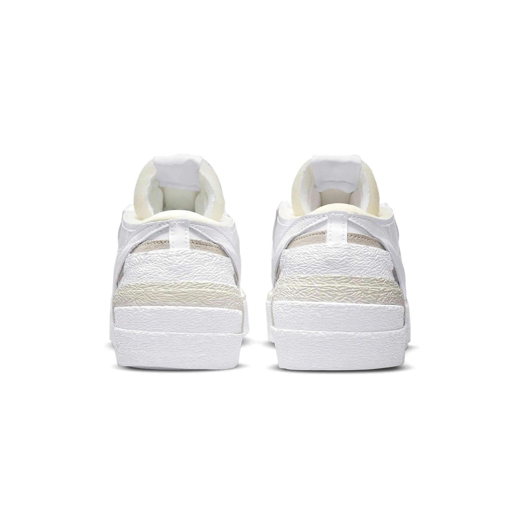 Kaws x sacai x Nike Blazer Low 'White Patent' Sacai collaboration