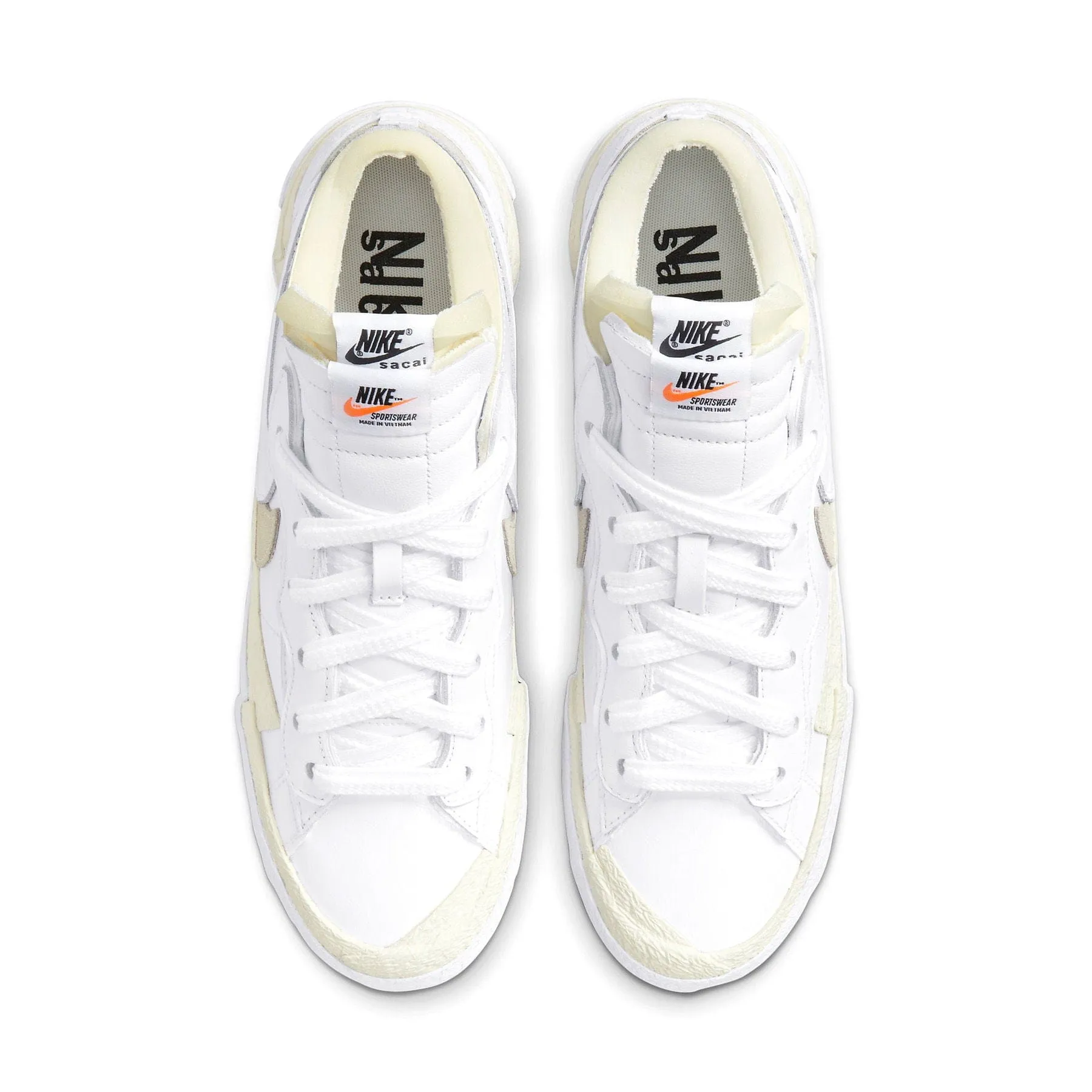 Kaws x sacai x Nike Blazer Low 'White Patent' Sacai collaboration