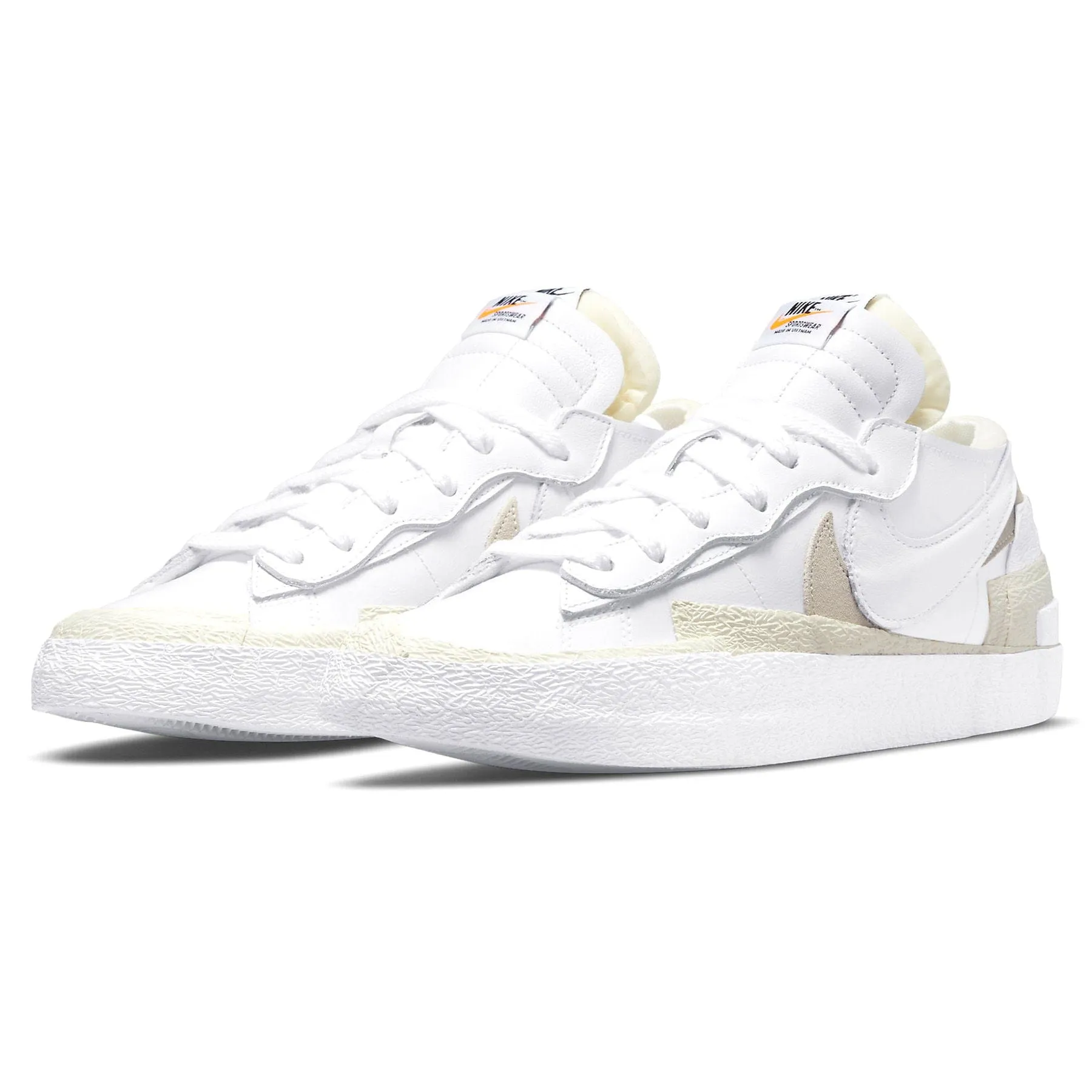 Kaws x sacai x Nike Blazer Low 'White Patent' Sacai collaboration
