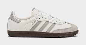 Samba OG Womens Lifestyle Shoes (Cloud White/Clear Granite/Gold Metallic) Adidas Samba shoes with iconic T-toe design