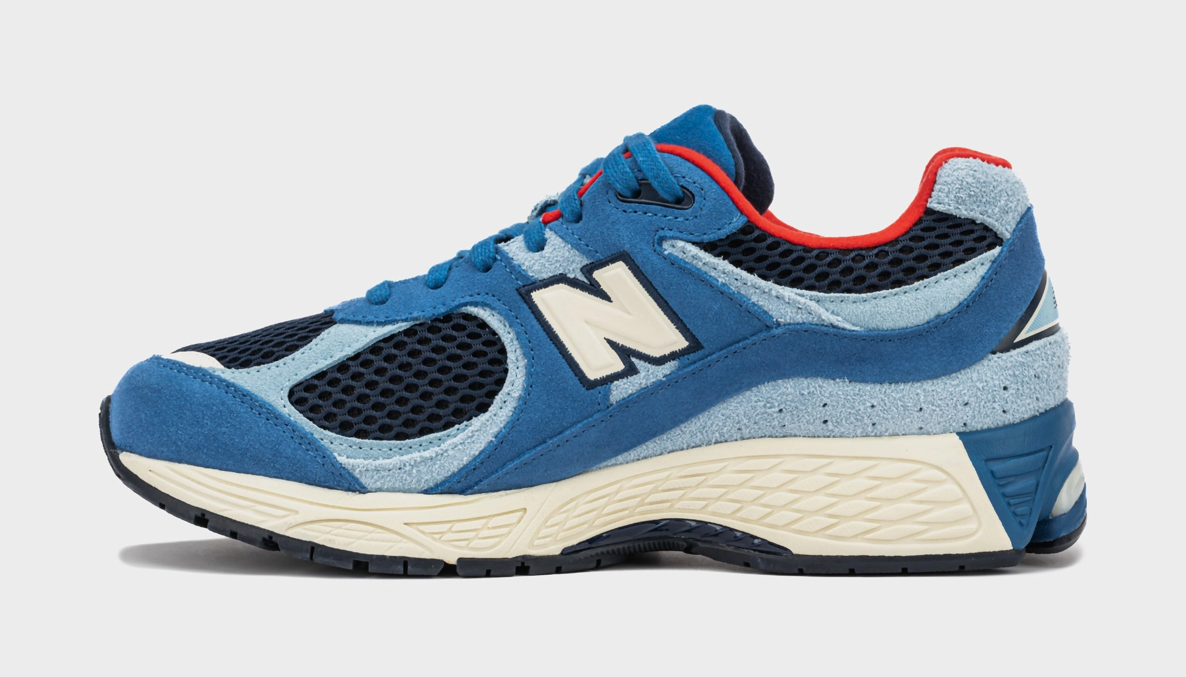 Shoe Palace x New Balance 2002R Volcanic Rocks Mens Running Shoes (Blue/Red) Modern performance sneakers