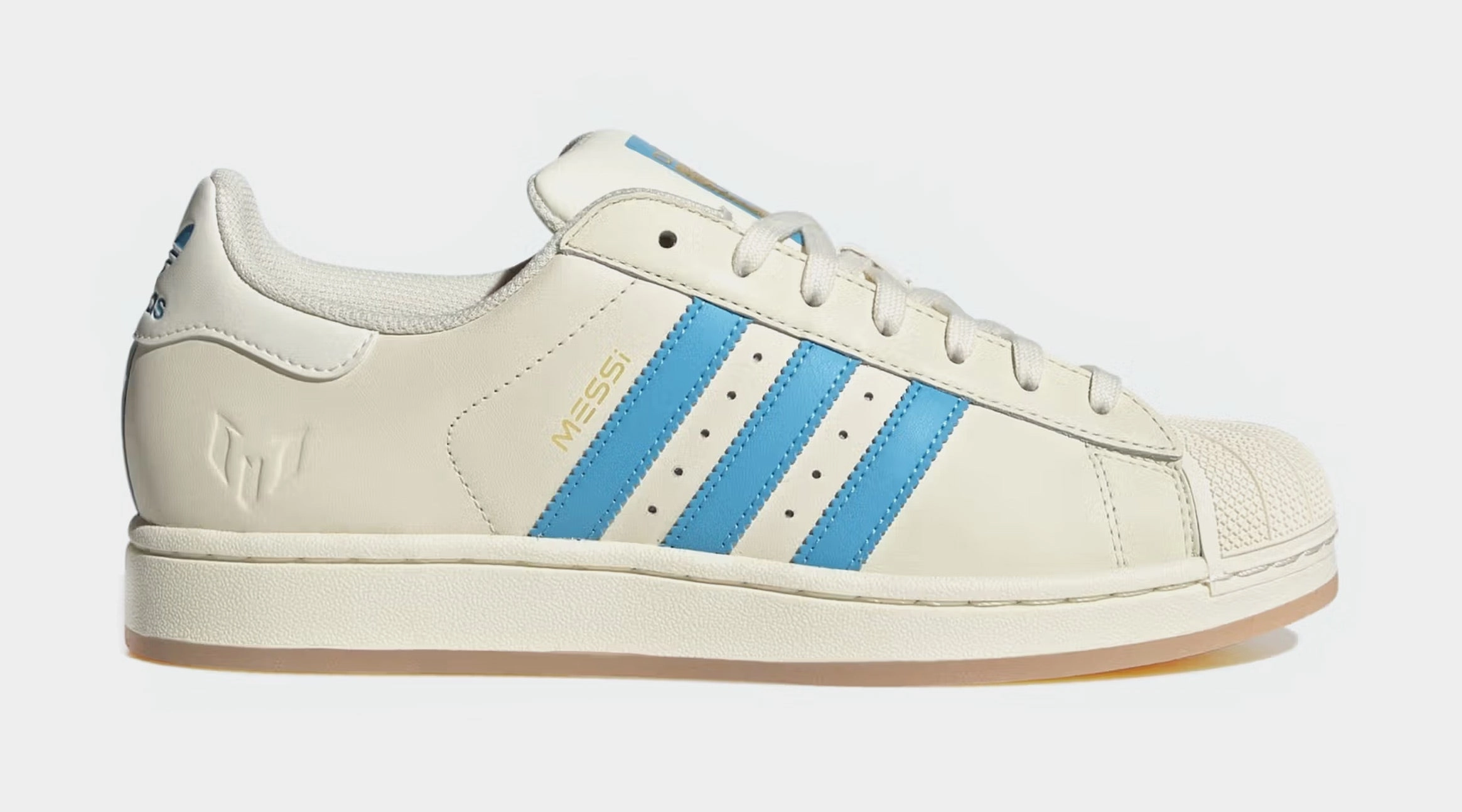 Superstar Messi Mens Lifestyle Shoes (White/Blue) Adidas Superstar shell-toe sneakers with timeless appeal