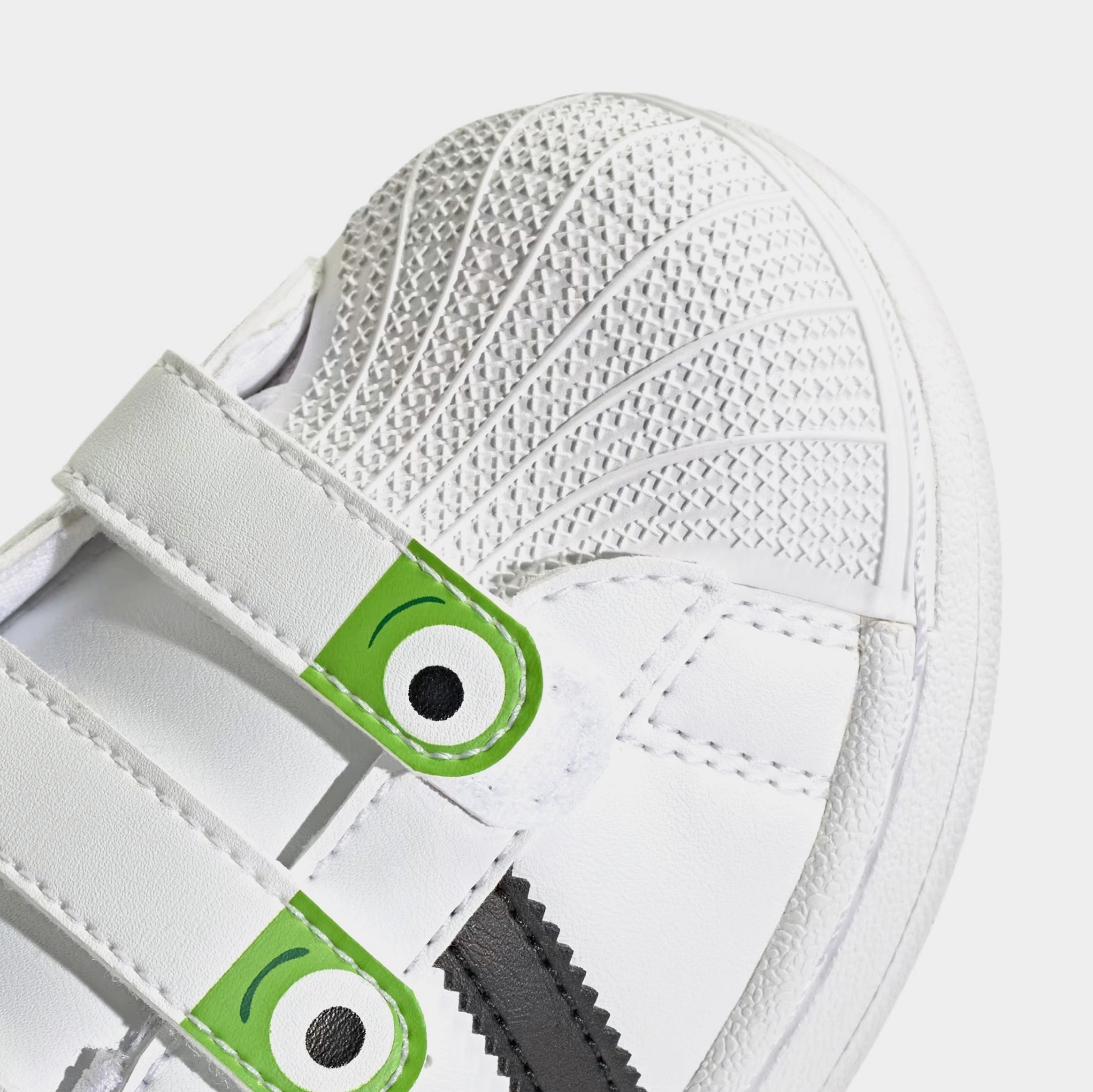 Toy Story Alien Superstar II Preschool Lifestyle Shoes (Cloud White/Core Black/Semi Solar Green) Shell toe urban sneakers